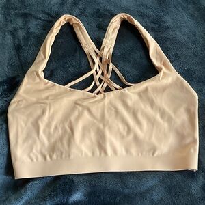 Lululemon flexy strappy yoga bra. Worn only once, still have insert pads.